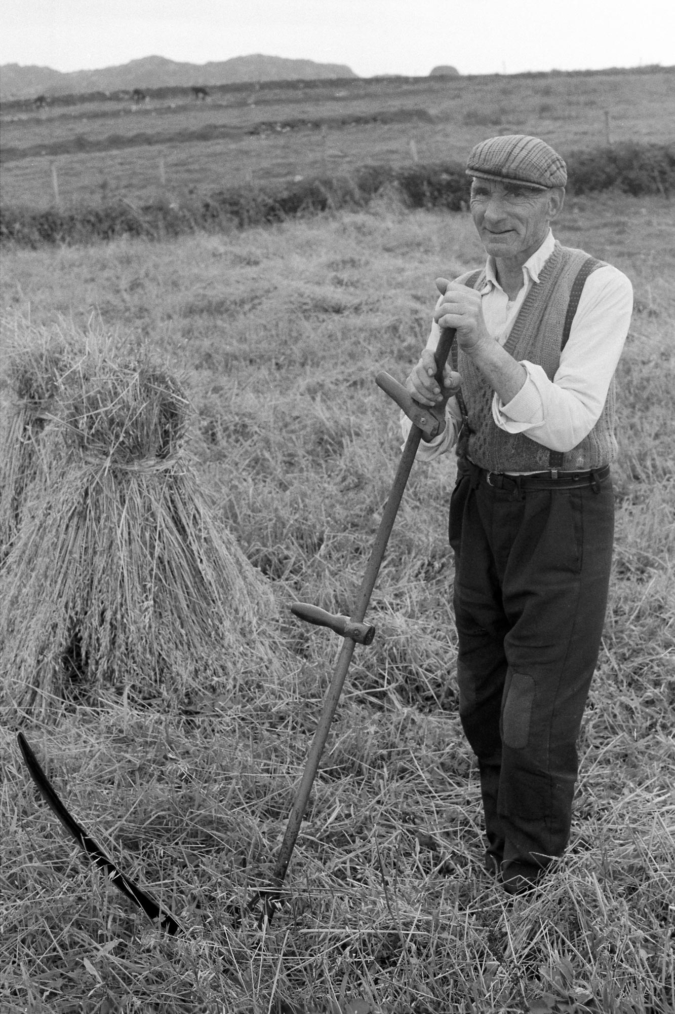 Image 1 caption - Man with Sythe